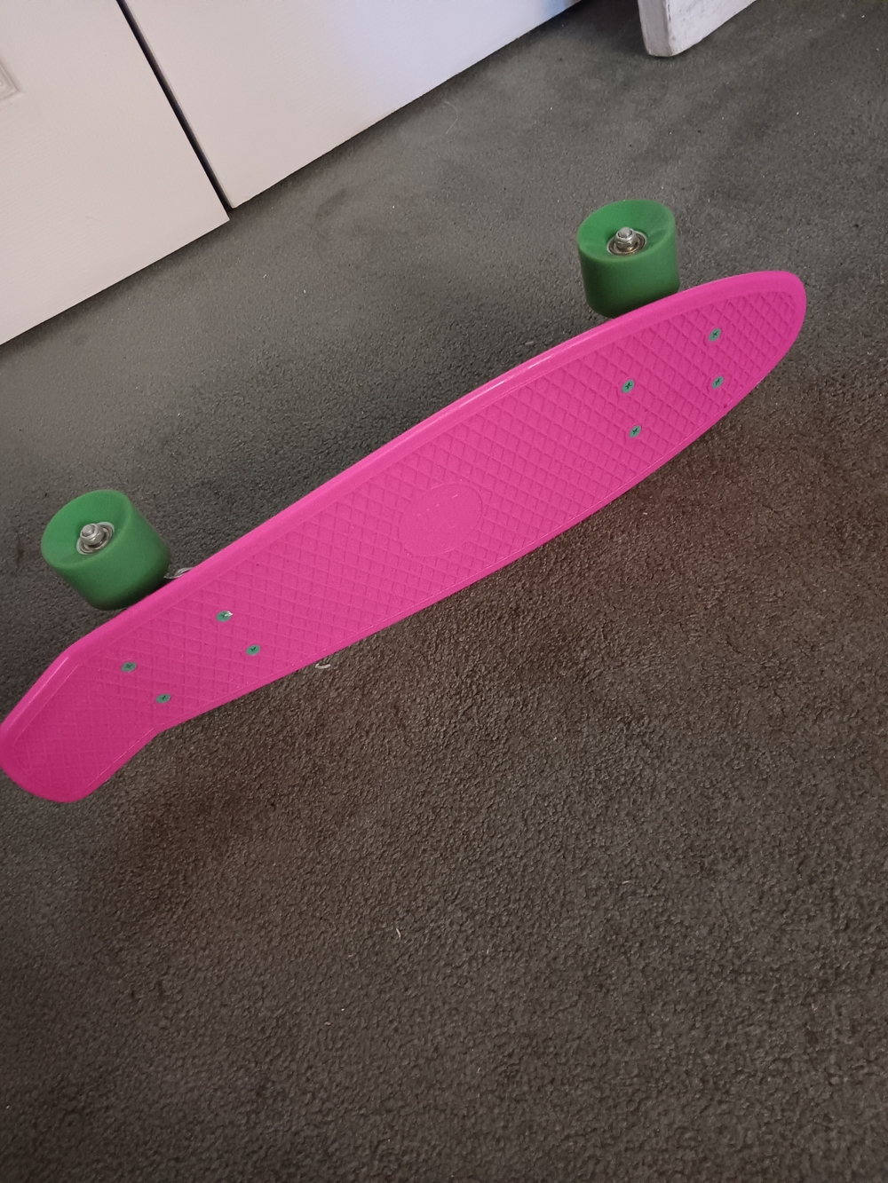 Hot Pink Cruiser Skateboard with Green Wheels